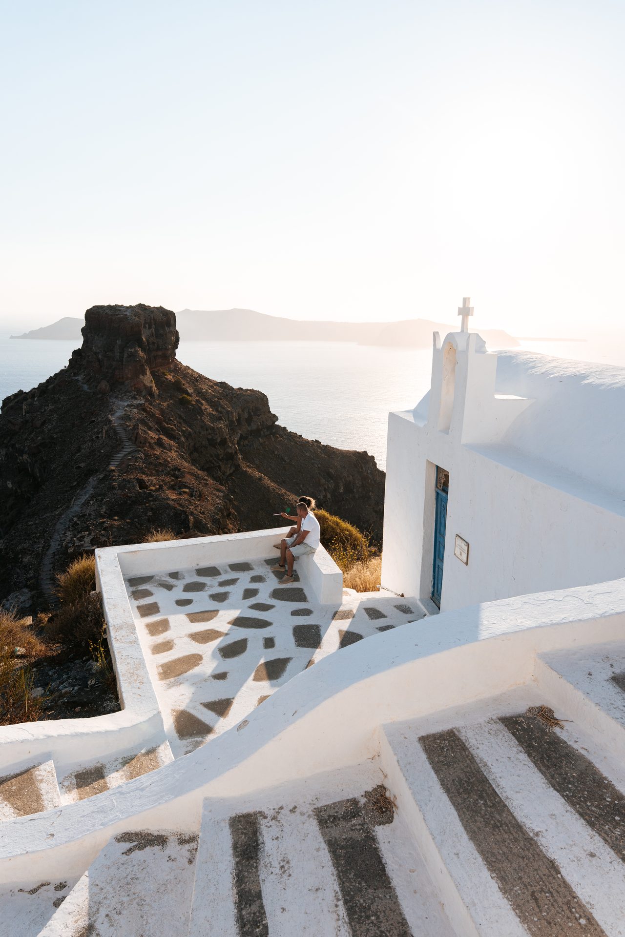Proposal on the Agios Georgios chapel terrace with Skaros Rock behind, Imerovigli, Santorini