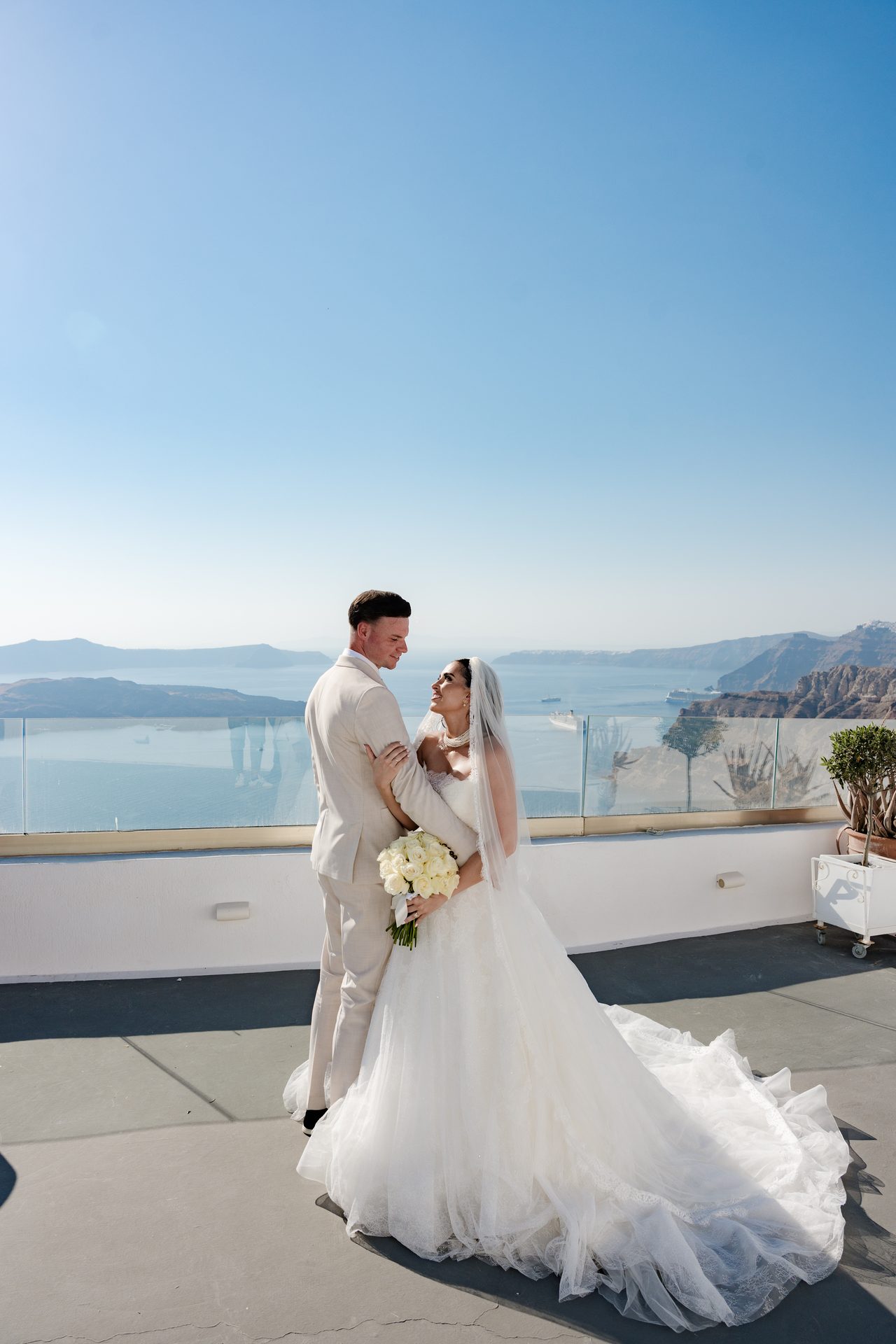 Santorini destination wedding: ceremony, portraits and reception by Alexandros Sirigos