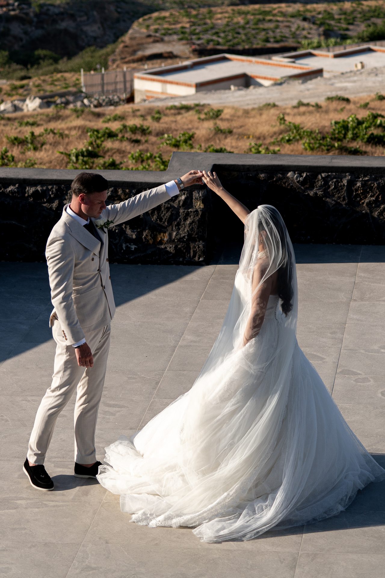 Santorini destination wedding: ceremony, portraits and reception by Alexandros Sirigos